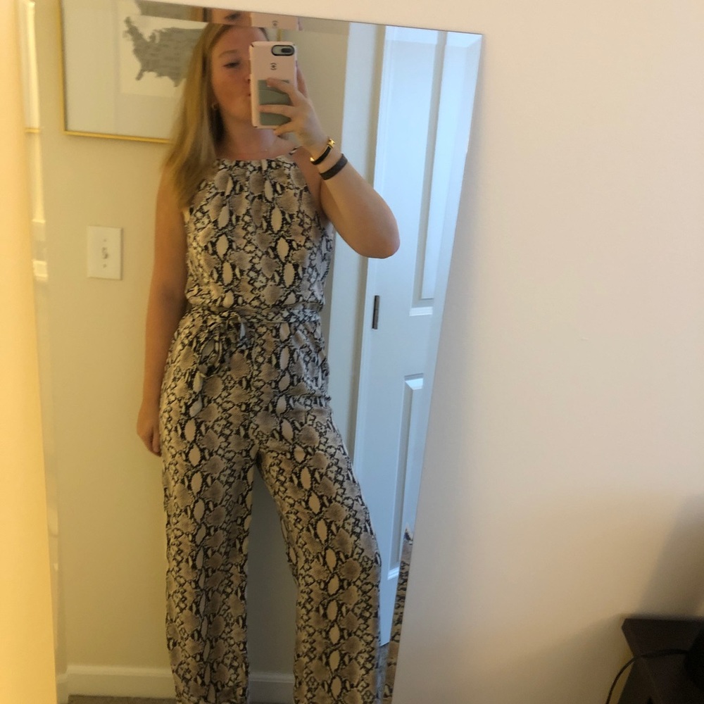 Selling a fun print belted romper!